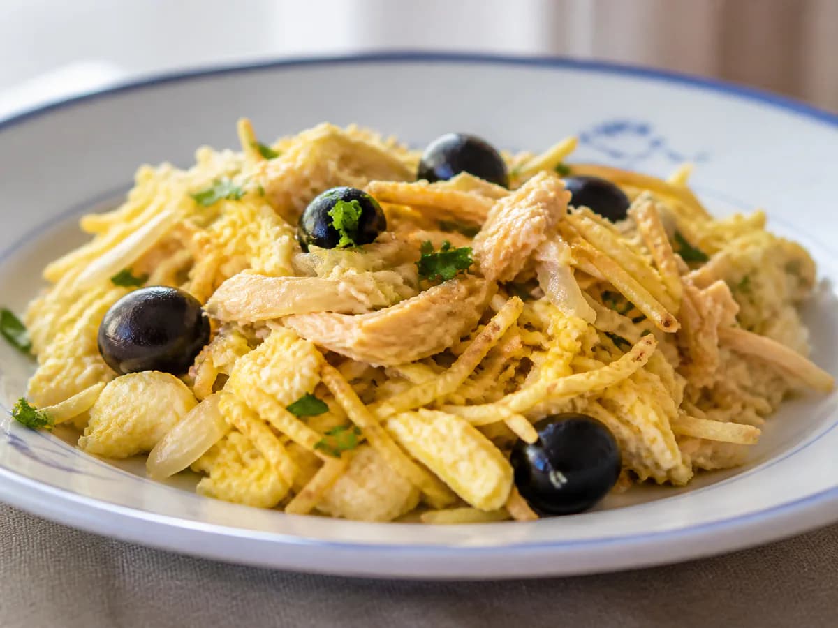 Pormenor de uma porção de Frango à Brás