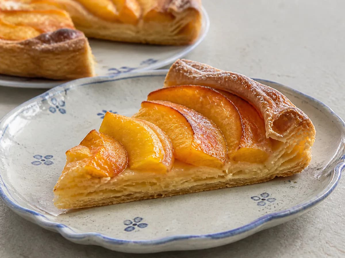 Pormenor de uma porção de Tarte de Pêssego