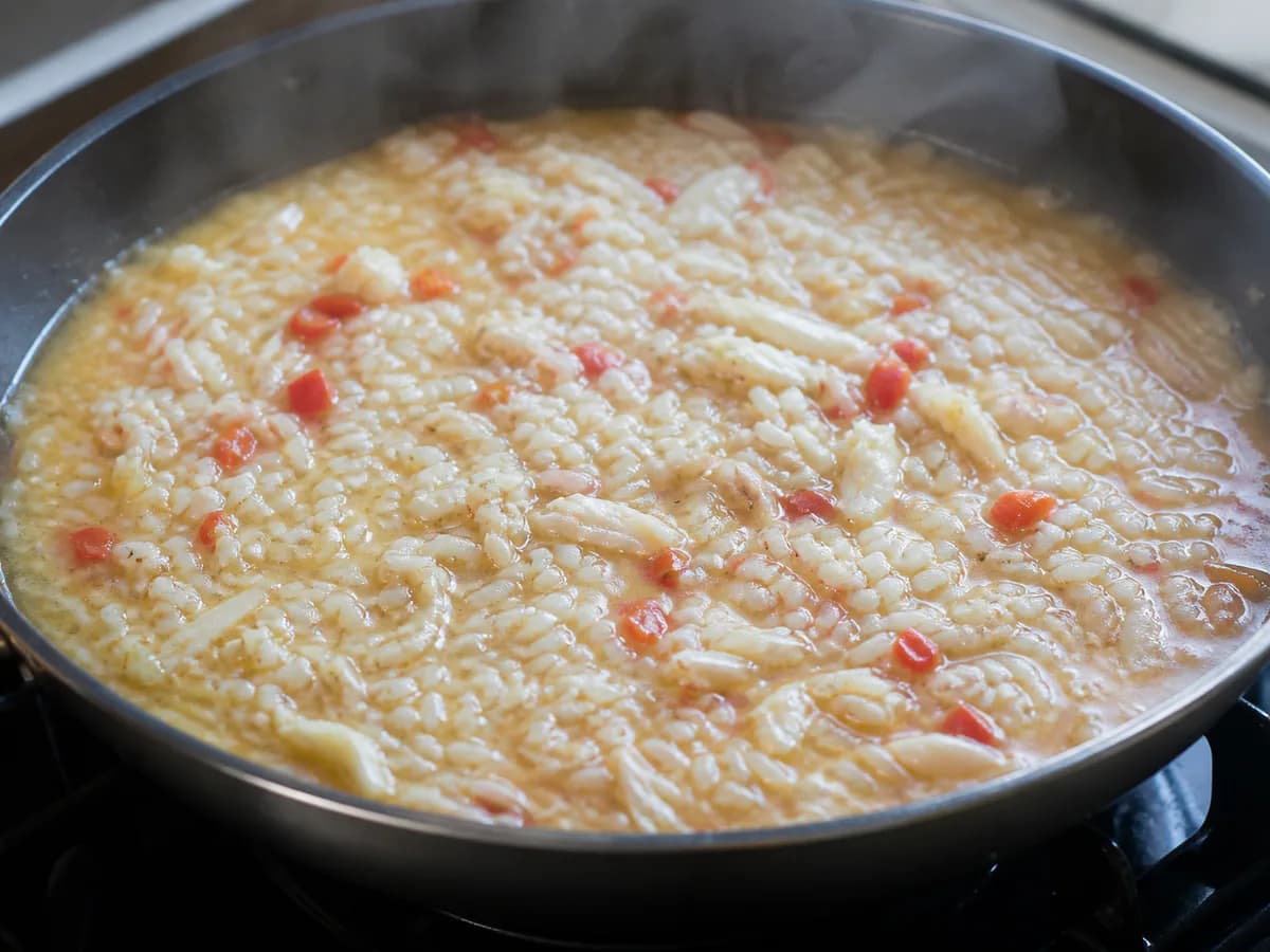 Preparação de Arroz de Bacalhau no Forno durante a confeção