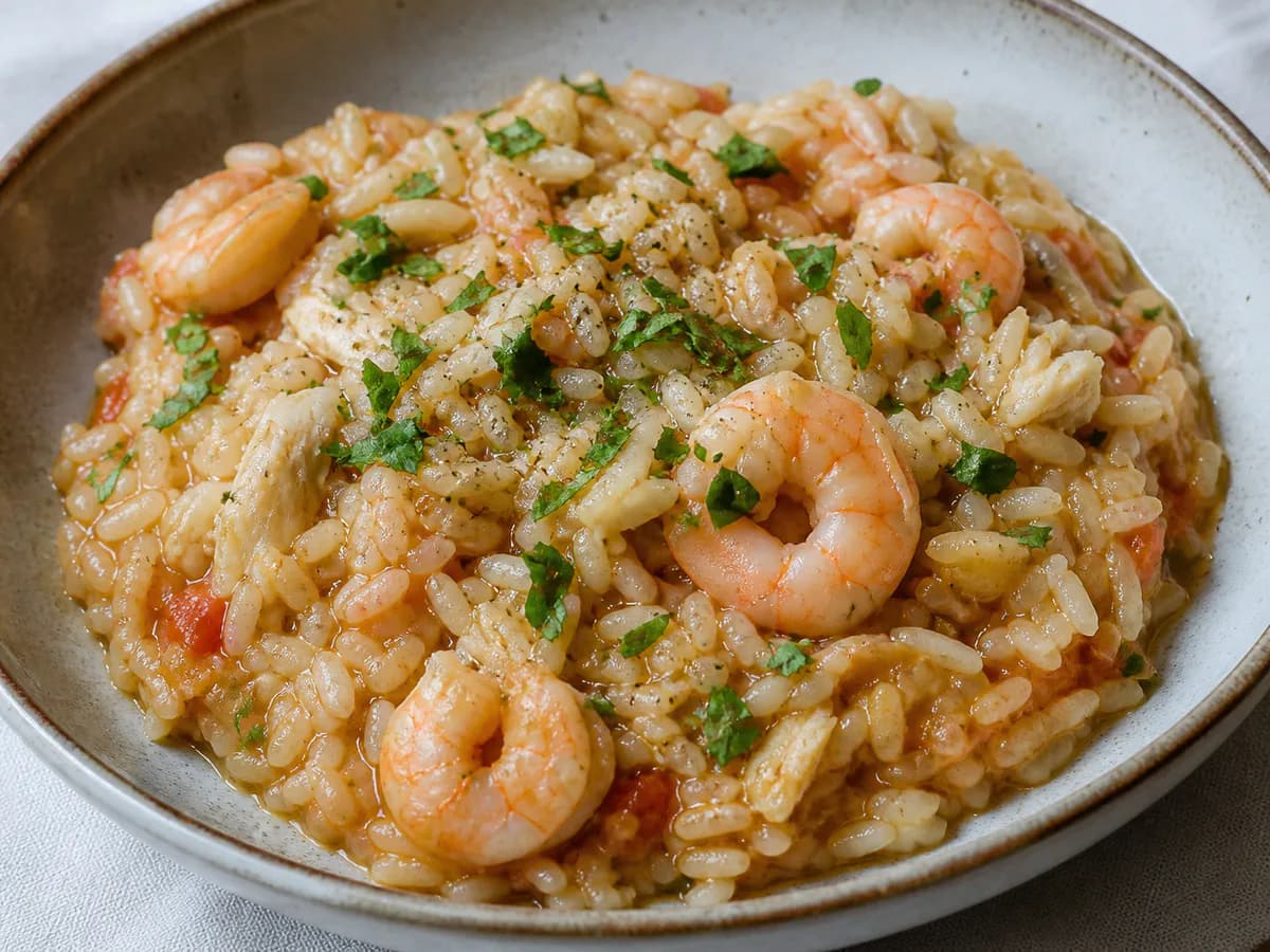 Pormenor de uma porção de Arroz de Bacalhau e Camarão