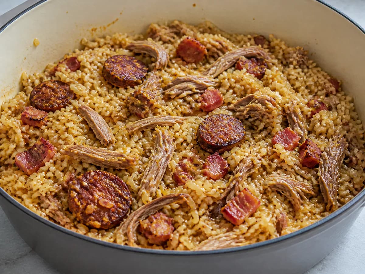 Preparação de Arroz de Pato com Laranja durante a confeção