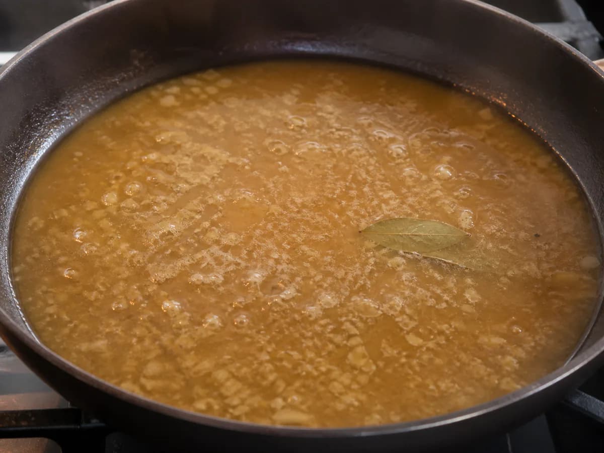 Preparação de Bife à Cervejeira durante a confeção