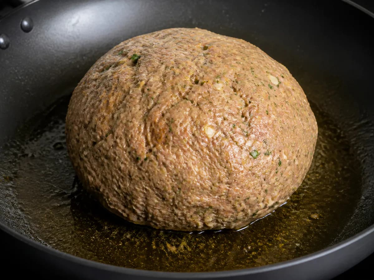 Preparação de Bola de Carnes Fofinha durante a confeção