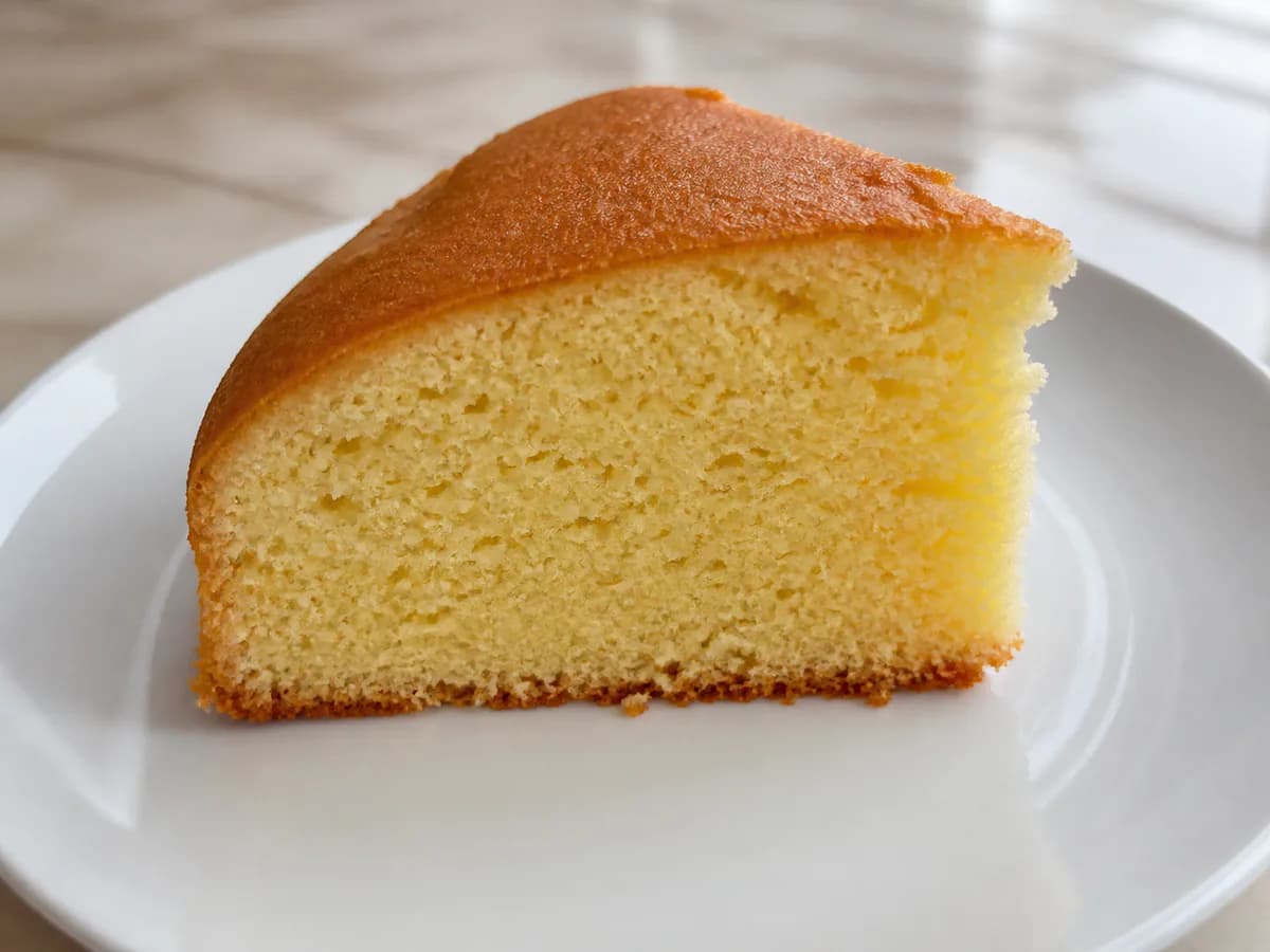 Pormenor de uma porção de Bolo Casa Um Cheirinho Delicioso
