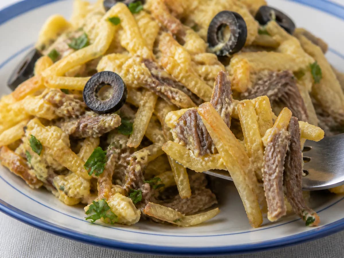 Pormenor de uma porção de Carne à Brás