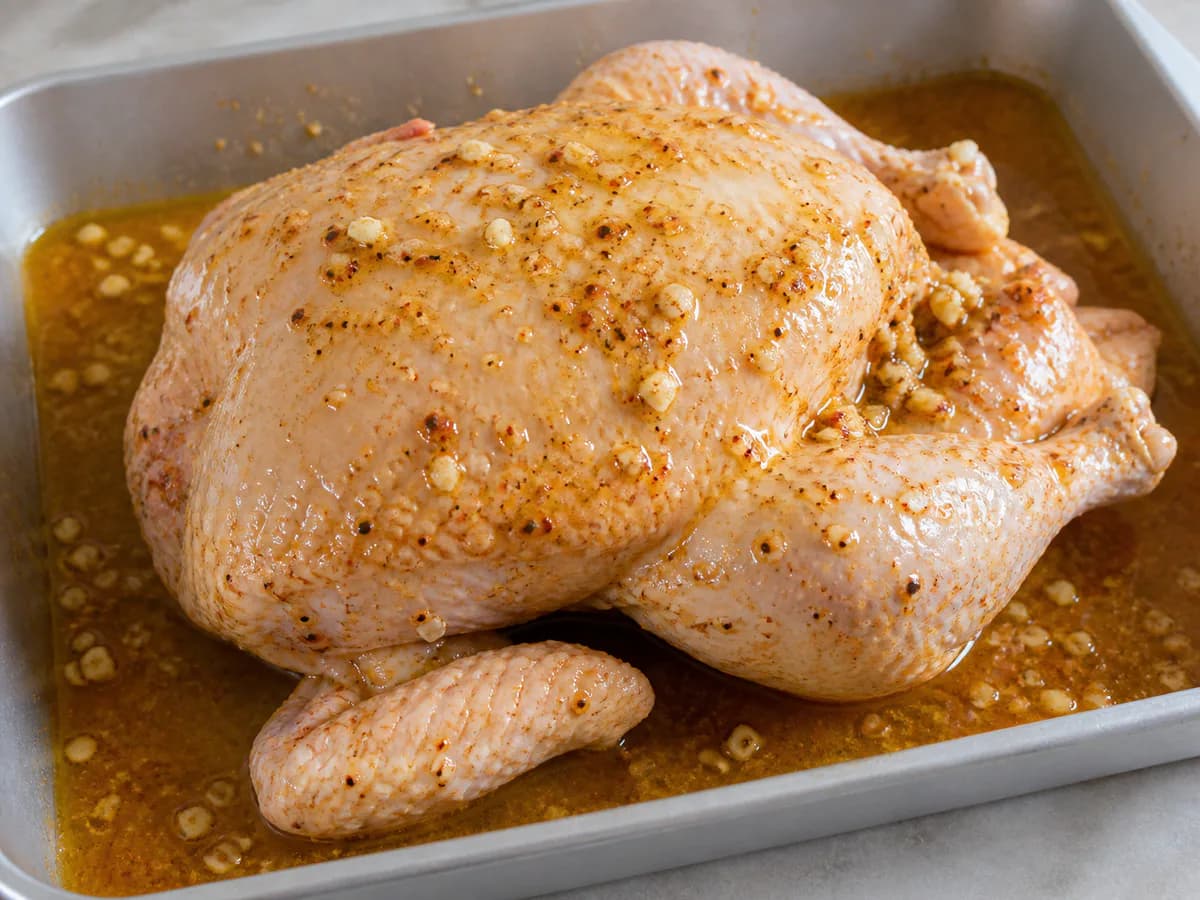 Preparação de Frango no Forno com Cachaça e Limão durante a confeção