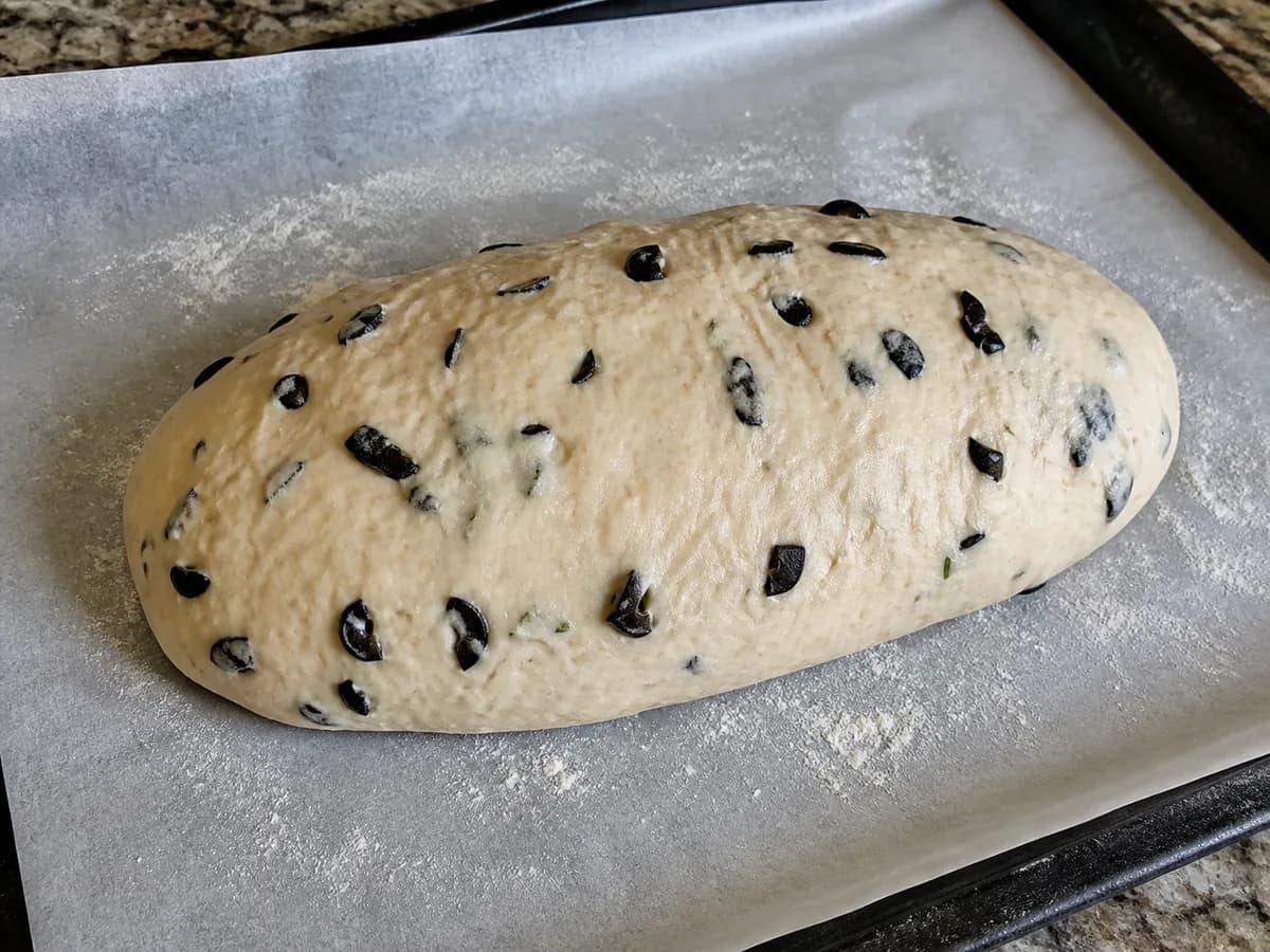 Preparação de Pão de Azeitonas Caseiro durante a confeção
