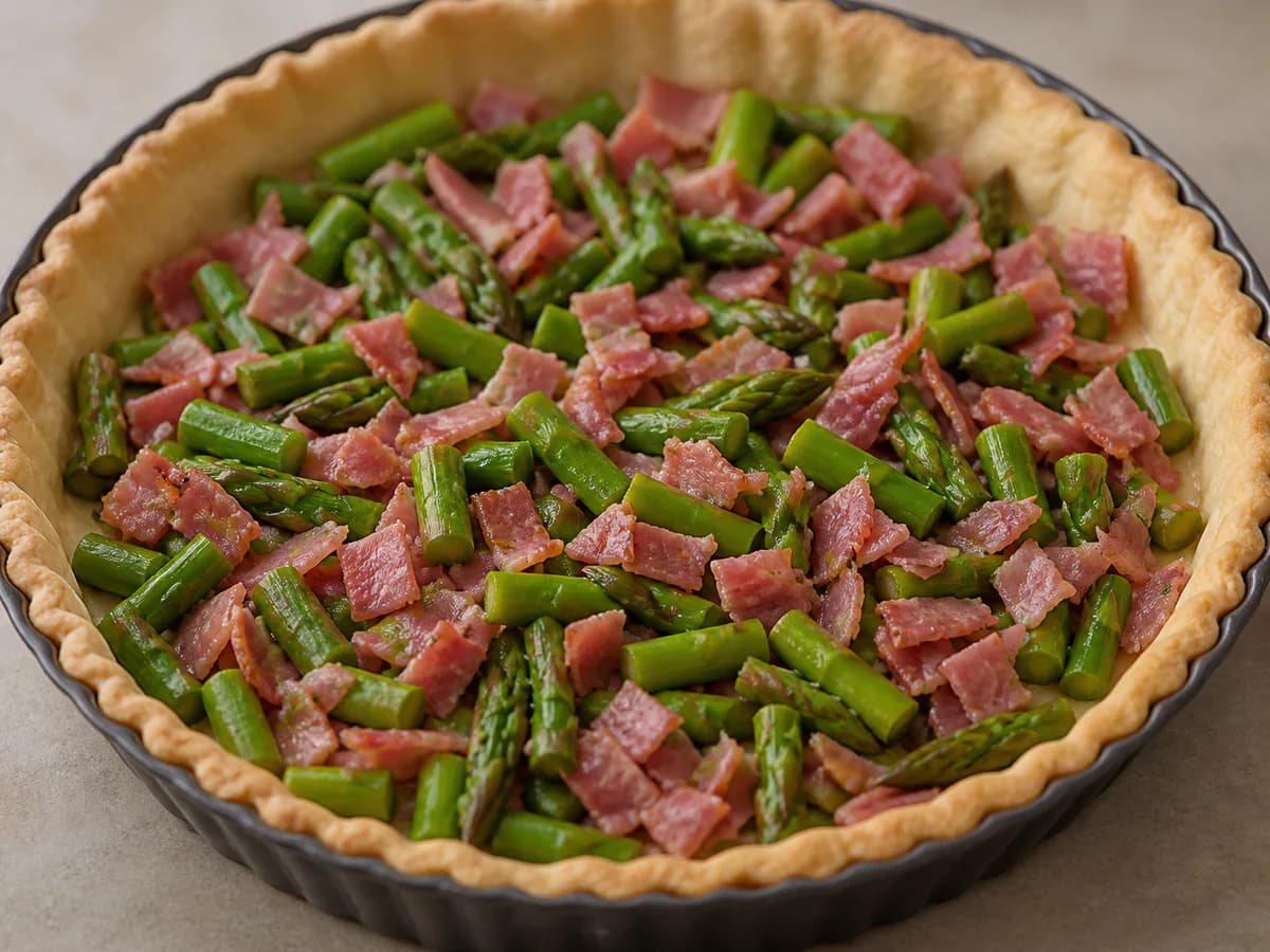 Preparação de Quiche de Espargos e Presunto durante a confeção