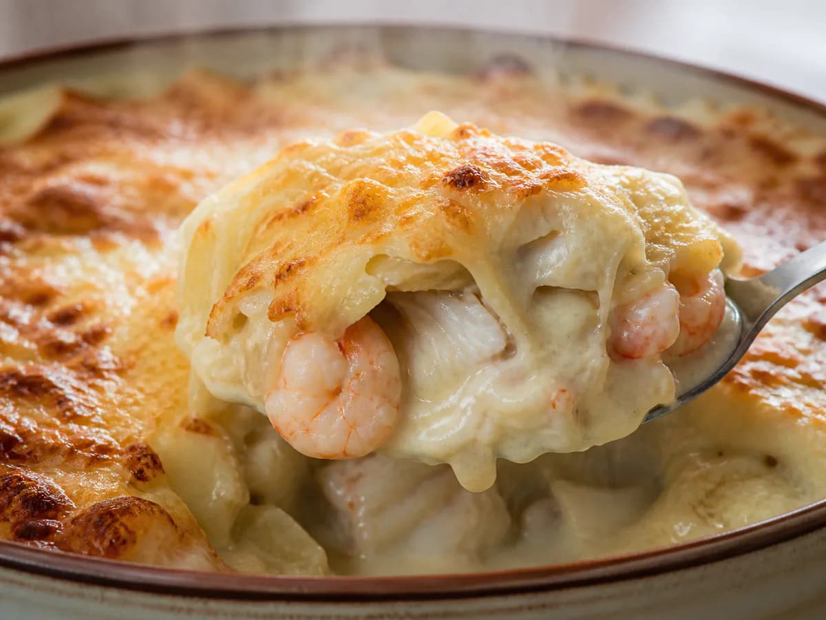 Pormenor de uma porção de Rolo de Bacalhau com Camarão