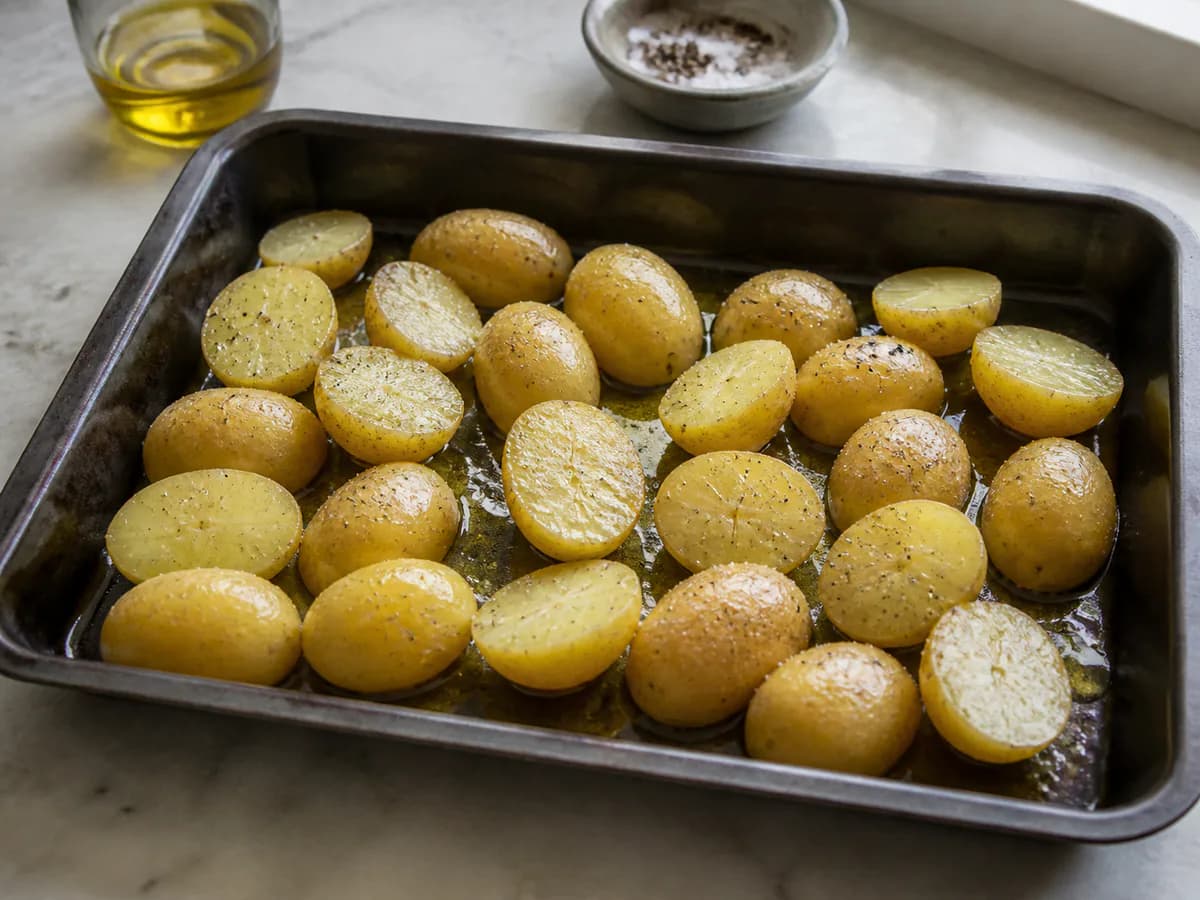 Preparação de Saiba Como Preparar Um Bacalhau à Lagareiro Perfeito durante a confeção