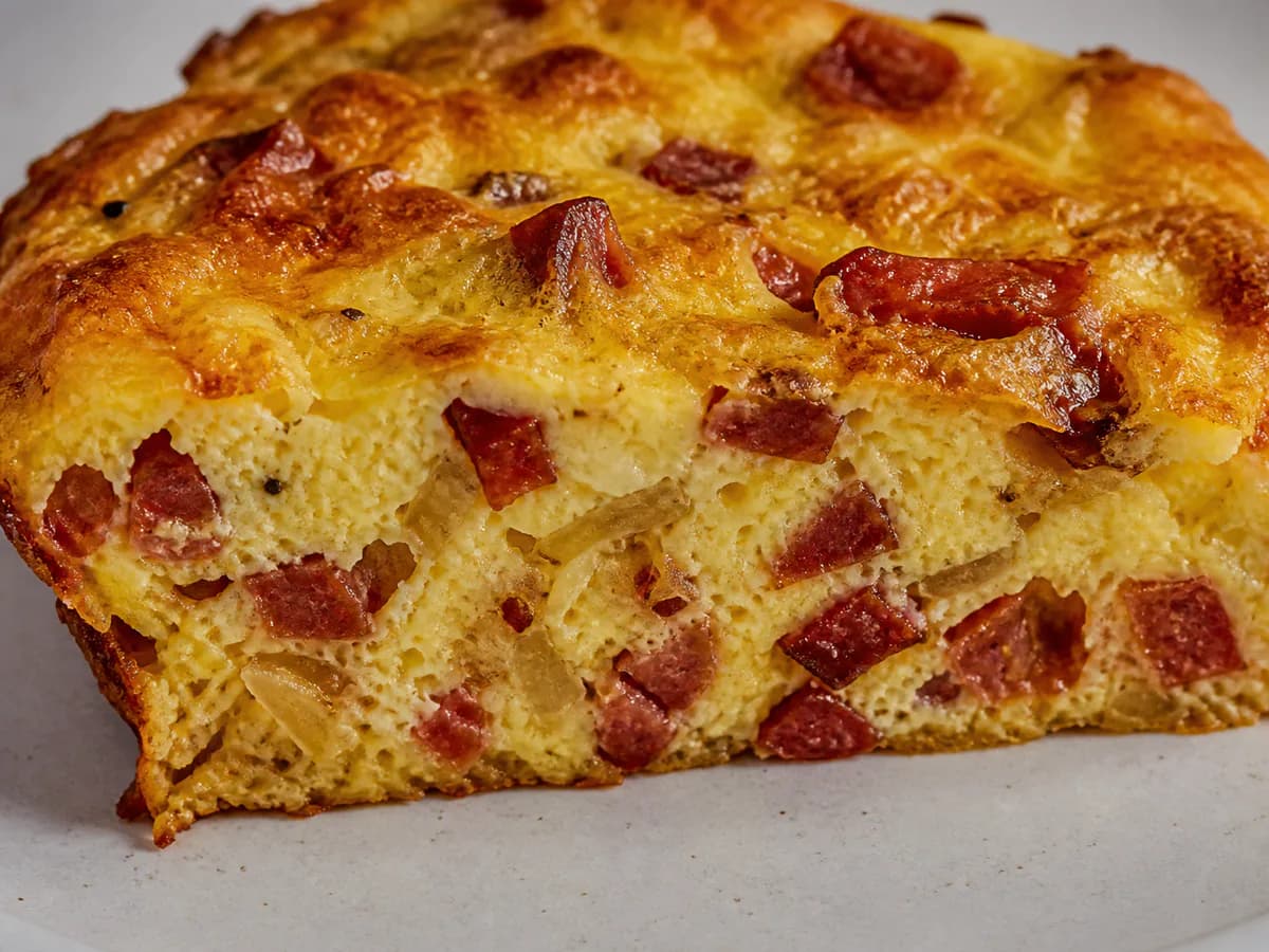 Pormenor de uma porção de Sonhos de Creme e Chouriço